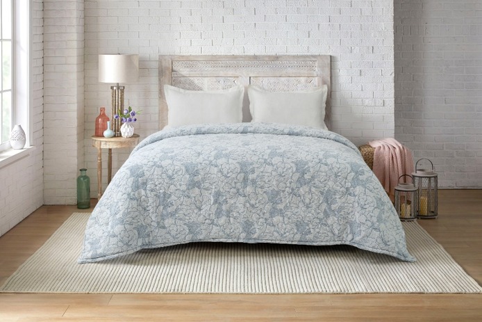 Blue floral quilted bedcover